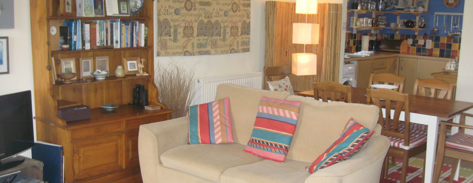 Lilburns Pier sitting room, dining area and kitchen