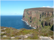Pillars of flame - the stunning cliffs around St John's Head and the Old Man of Hoy